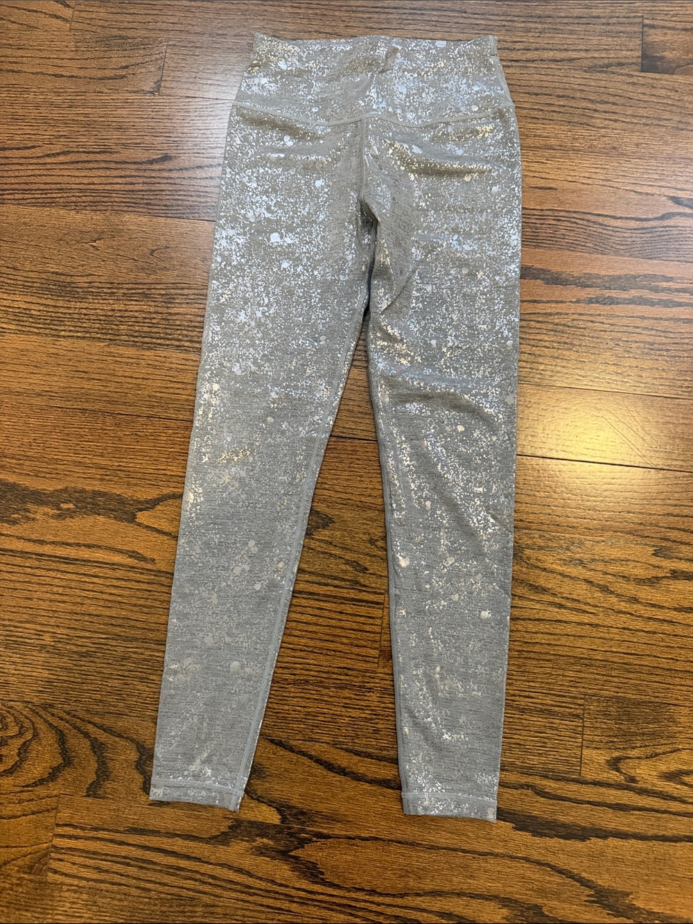 Women’s silver shiny leggings Sweaty Betty